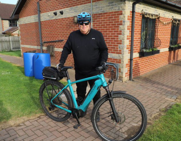 Jeff Lockhart next to his bike