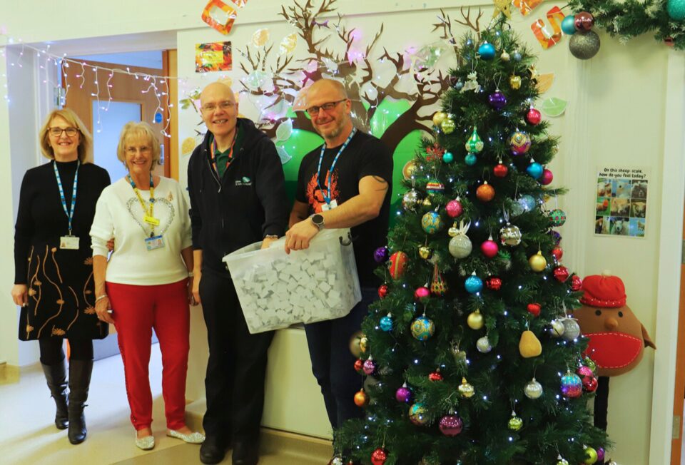 St John's Hospice staff drawing the lucky Christmas Raffle winners