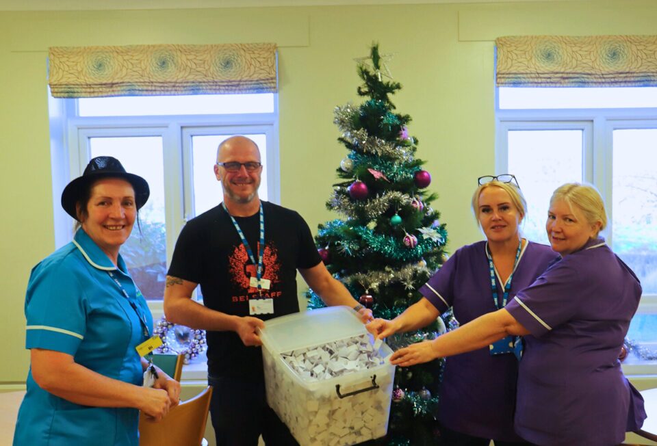 St John's Hospice nurses drawing the lucky Christmas Raffle winners