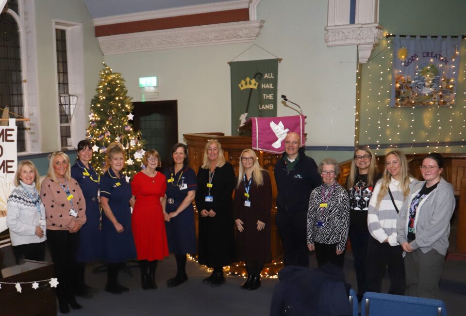Group of people within Alder Grove Methodist Church.
