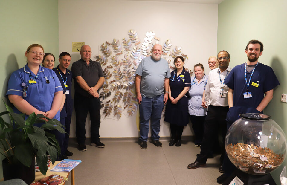 People standing around the memory tree